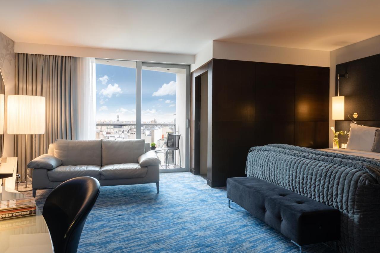 Hotel Renaissance Arc De Triomphe 5*